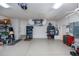 Spacious garage with epoxy flooring offering ample storage and workspace at 1435 Pine Island Ct, Punta Gorda, FL 33950