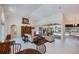 Spacious living room with an open floorplan features a view of the outdoor pool at 1435 Pine Island Ct, Punta Gorda, FL 33950