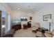 Bright living room featuring tile floors and a sliding glass door leading to the lanai at 1435 Pine Island Ct, Punta Gorda, FL 33950