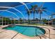 Screened in pool and spa overlooking a serene canal at 1435 Pine Island Ct, Punta Gorda, FL 33950