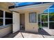 Enclosed pool bath with tile accents offers backyard convenience at 1435 Pine Island Ct, Punta Gorda, FL 33950
