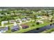 Residential homes from above display canal views and proximity to the local golf course at 15 Tournament Rd, Rotonda West, FL 33947