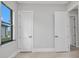 Bright bedroom featuring a window with natural light and neutral-toned walls at 15 Tournament Rd, Rotonda West, FL 33947