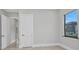 Bright bedroom with window and neutral walls at 15 Tournament Rd, Rotonda West, FL 33947