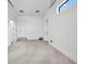 Clean, bright garage with tiled floors and ample space at 15 Tournament Rd, Rotonda West, FL 33947