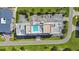 Birds eye view of building shows the parking and rooftop pool at 1500 Park Beach Cir # 2F, Punta Gorda, FL 33950