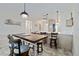 Open-concept dining space flows seamlessly from kitchen, great for hosting and enjoying meals at 1500 Park Beach Cir # 2F, Punta Gorda, FL 33950