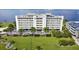 Exterior elevation view of the condo building, highlighting its architecture and setting at 1500 Park Beach Cir # 2F, Punta Gorda, FL 33950