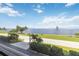 Scenic waterfront views showing a walking path, bright blue sky, and lush greenery at 1500 Park Beach Cir # 2F, Punta Gorda, FL 33950