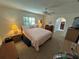 Bright bedroom with ceiling fan, and ample natural light creating a peaceful retreat at 1505 Kenmore St, Port Charlotte, FL 33952