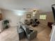Comfortable living room with modern seating, neutral tones, and natural light at 1505 Kenmore St, Port Charlotte, FL 33952