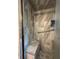 Modern tile shower with grab bar and built-in seat offering a spa-like experience at 1505 Kenmore St, Port Charlotte, FL 33952