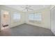 Spacious bedroom with carpet and ensuite bathroom access at 1596 Hayworth Rd, Port Charlotte, FL 33952