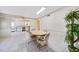 View of the dining room that shows the kitchen in the background at 1596 Hayworth Rd, Port Charlotte, FL 33952
