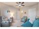Comfortable bedroom space featuring neutral walls and tones, versatile furniture for relaxation or hobbies at 16032 Galiano Ct, Punta Gorda, FL 33955