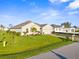 Beautiful single-story home with a lush green lawn and meticulously maintained landscaping in a desirable neighborhood at 16032 Galiano Ct, Punta Gorda, FL 33955