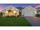 Charming single-story home with well-manicured lawn and a two-car garage at 16032 Galiano Ct, Punta Gorda, FL 33955