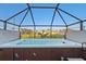 Relax in this hot tub, which is encased in a screened enclosure, on a sunny day at 16032 Galiano Ct, Punta Gorda, FL 33955