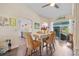 Bright dining area with a view of the pool, featuring elegant table setting and inviting atmosphere at 17396 Cox Ave, Port Charlotte, FL 33948