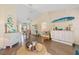 Inviting living room featuring stylish decor, open layout, and seamless flow into the dining area at 17396 Cox Ave, Port Charlotte, FL 33948