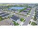 Gorgeous aerial view of a community surrounding a large body of water, showcasing neighborhood layout at 17629 Palmetto Pass Ln, Punta Gorda, FL 33982