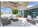 Covered patio featuring comfortable seating, providing a relaxing outdoor living space at 17629 Palmetto Pass Ln, Punta Gorda, FL 33982