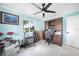 Office space with built-in desk and storage, neutral walls, and natural light from the window at 192 Danforth S Dr, Port Charlotte, FL 33980