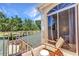 This cozy balcony has outdoor seating and neighborhood views at 206 Gondola Park Dr # 206, Venice, FL 34292