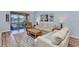 Comfortable living room with sliding glass doors to the balcony at 206 Gondola Park Dr # 206, Venice, FL 34292