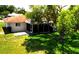 Aerial view of backyard, patio, and home at 2119 Pellam Blvd, Port Charlotte, FL 33948