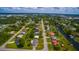 Scenic aerial view showing lush residential area and waterfront access at 2119 Pellam Blvd, Port Charlotte, FL 33948