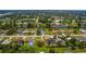Aerial view showcasing neighborhood homes, green spaces, and waterway access at 2119 Pellam Blvd, Port Charlotte, FL 33948