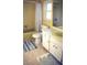 Bathroom featuring a shower, a vanity with storage, and neutral paint at 2119 Pellam Blvd, Port Charlotte, FL 33948