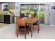 Cozy dining area with access to kitchen and outdoor patio at 2119 Pellam Blvd, Port Charlotte, FL 33948