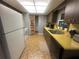 Functional kitchen with classic cabinetry and ample counter space at 2119 Pellam Blvd, Port Charlotte, FL 33948