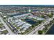 An aerial view highlighting the community's waterfront location, canal access and amenities at 2521 W Marion Ave # 912, Punta Gorda, FL 33950
