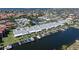 Aerial view of waterfront community with boat docks and nearby ocean at 2521 W Marion Ave # 912, Punta Gorda, FL 33950