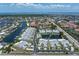 Aerial view of a waterfront condo community with nearby ocean and beaches at 2521 W Marion Ave # 912, Punta Gorda, FL 33950