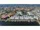Waterfront condo community with boat docks, central lake, and lush landscaping at 2521 W Marion Ave # 912, Punta Gorda, FL 33950
