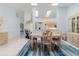 Elegant dining area featuring skylights and easy access to the kitchen and living spaces at 2521 W Marion Ave # 912, Punta Gorda, FL 33950