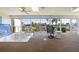 Enclosed lanai with a hot tub and panoramic views of the canal at 2521 W Marion Ave # 912, Punta Gorda, FL 33950