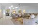 Spacious open-plan living room with skylights, tile floors and a view of the kitchen at 2521 W Marion Ave # 912, Punta Gorda, FL 33950