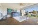 Bright sunroom features a jacuzzi, ceiling fan and sliding windows to enjoy the outdoors at 2521 W Marion Ave # 912, Punta Gorda, FL 33950