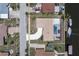 Aerial view of the home, pool and patio, with boats docked along the canal at 259 Fields Ter, Port Charlotte, FL 33952