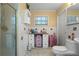Bathroom features an updated sink and walk-in shower with modern fixtures at 259 Fields Ter, Port Charlotte, FL 33952