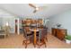 Dining area in an open layout with kitchen, bar, and dining room at 259 Fields Ter, Port Charlotte, FL 33952