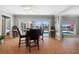 Bright dining area with a view of the pool and outdoor entertainment area at 259 Fields Ter, Port Charlotte, FL 33952