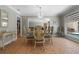 Bright dining room featuring a large window overlooking the pool at 259 Fields Ter, Port Charlotte, FL 33952