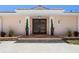 Inviting entrance features a covered porch, tiled steps, and decorative planters at 259 Fields Ter, Port Charlotte, FL 33952