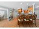 Eat-in kitchen featuring bar seating and a view of the formal dining area at 259 Fields Ter, Port Charlotte, FL 33952